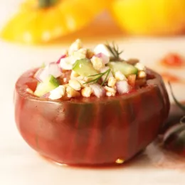 top of tomato sliced off and filled with bulgur and herbs