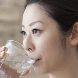 a woman drinking water