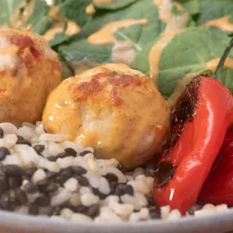 chicken meatballs with an assortment of sides