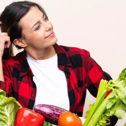 woman with box of mixed produce