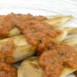 chicken cutlets with tomato sauce over the top