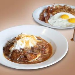 plate with dulce de leche pancakes from Denny's