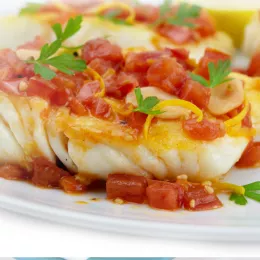 halibut with tomato sauce on plate