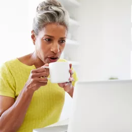 a woman drinking coffee