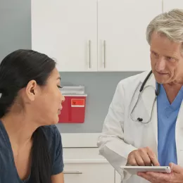 a woman talking to her doctor