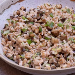 large bowl filled with creamy mushroom farrow