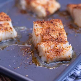 roasted white fish on a sheet pan