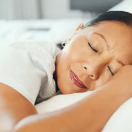 woman's head on a pillow, sleeping