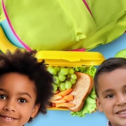 two children with healthy school lunch foods