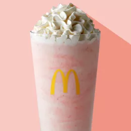 McDonald's strawberry milkshake with whipped cream on top