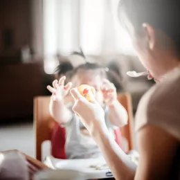 A baby being spoon fed