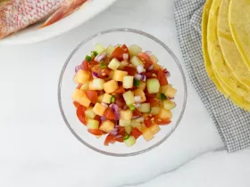 a bowl of melon salsa