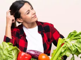 woman with box of mixed produce