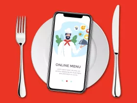 table setting with smartphone showing an online ordering app