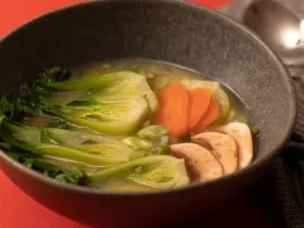 miso soup with bok choy, mushrooms, and carrots