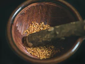 Sesame seeds in grinding bowl