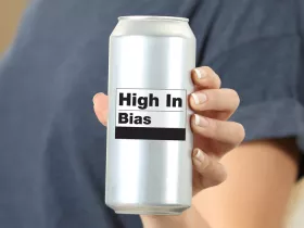 a woman holding a can of soda with a "high in bias" label on it