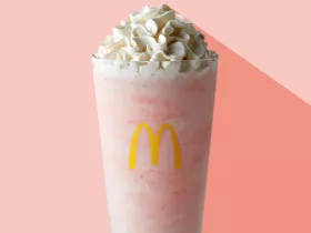 McDonald's strawberry milkshake with whipped cream on top