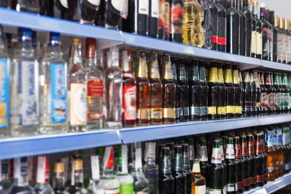 Alcohol bottles on shelves