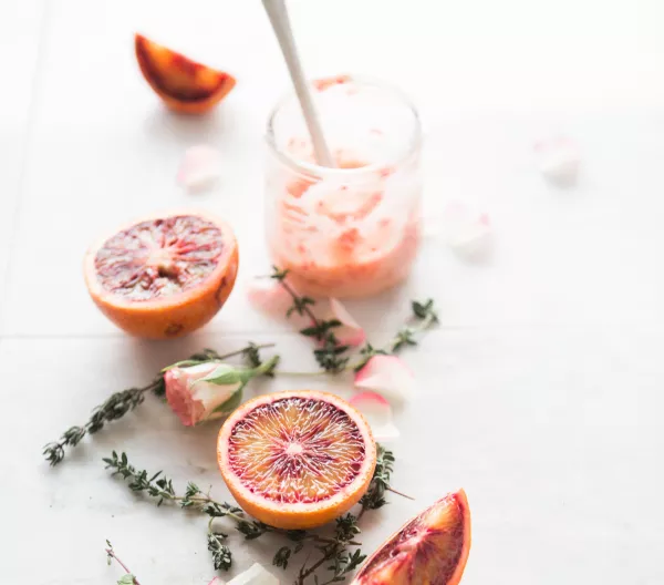 Pink smoothie, grapefruit, pink flowers