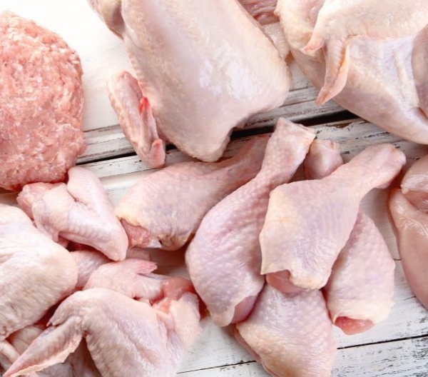 Raw chicken and poultry on a cutting board