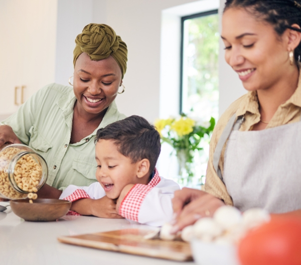 a happy family having cereal for breakfast