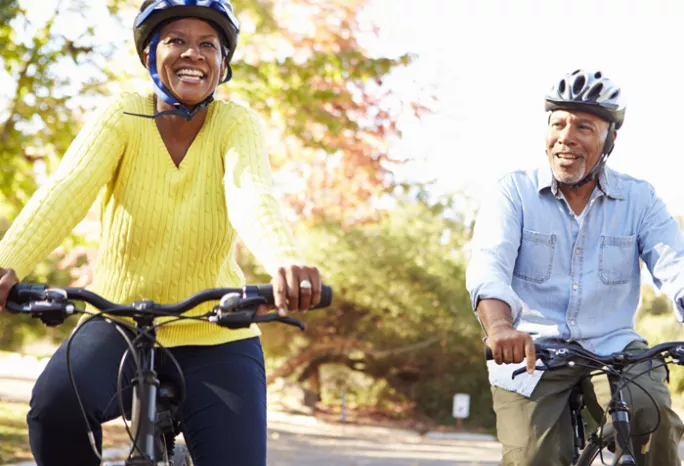 a couple riding their bikes