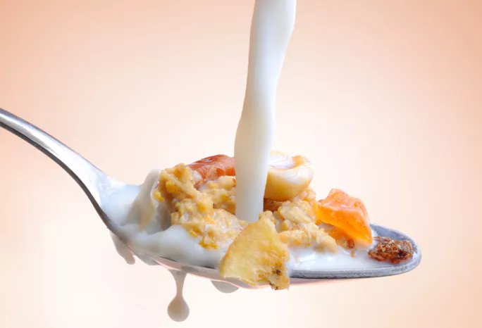 cereal and milk on a spoon