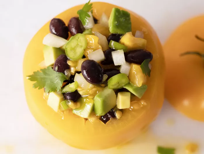 tomato stuffed with black bean mixture 