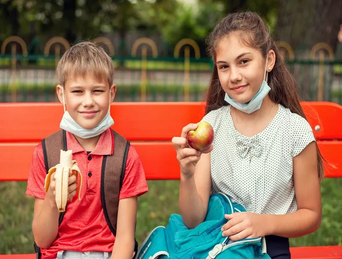 Kids with fruit