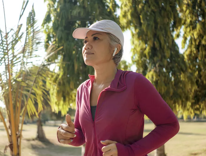 a middle-aged woman jogging