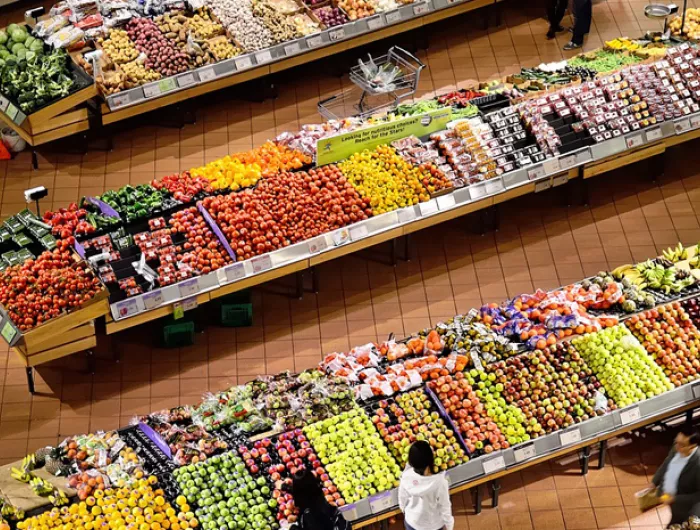 overhead view of a supermarket produce aisle