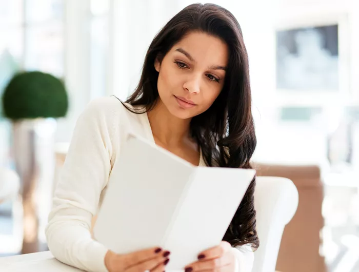 woman reading a menu