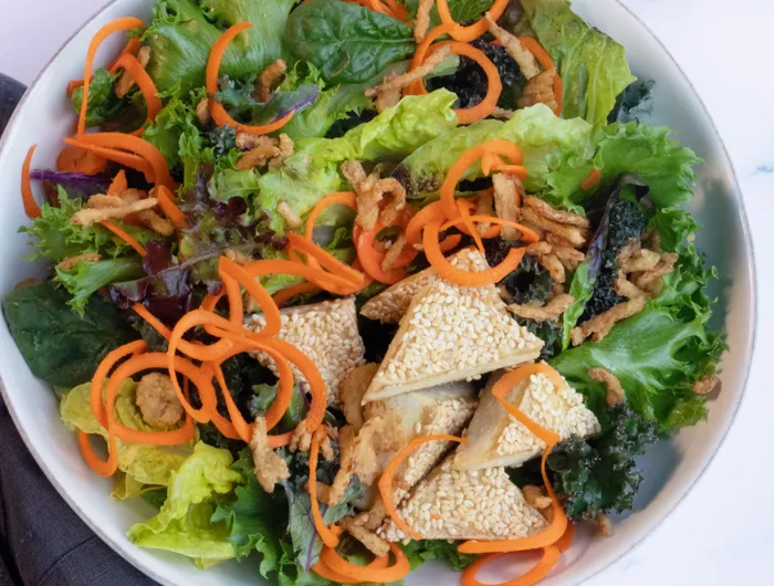 tofu with multicolored vegetables in bowl