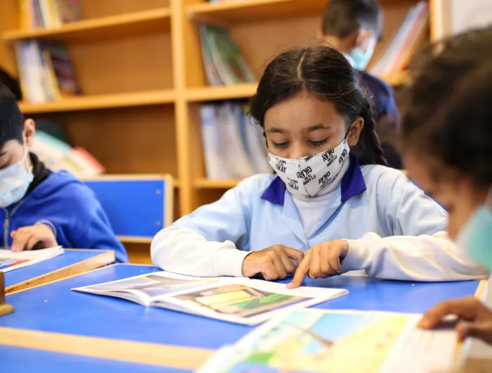 Children learning in a classroom after a healthy lunch