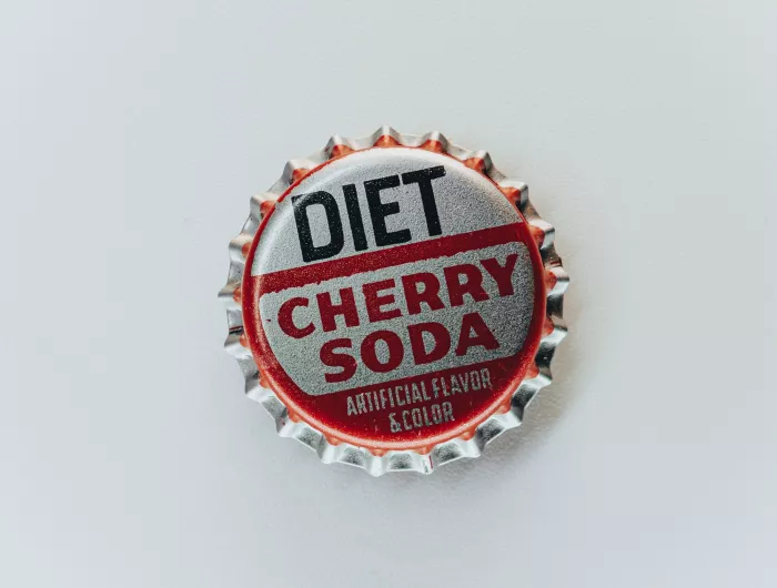 Bottle cap that say "Diet Cherry Soda - Artificial Flavor & Color"