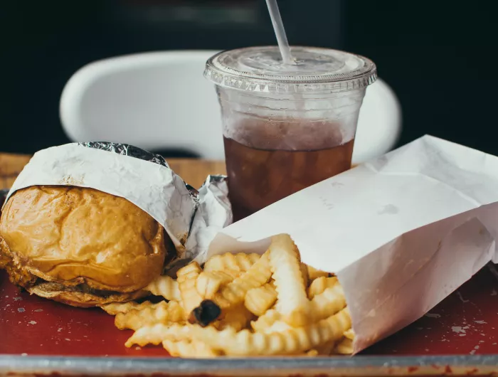 Burger and fries with a fountain soda