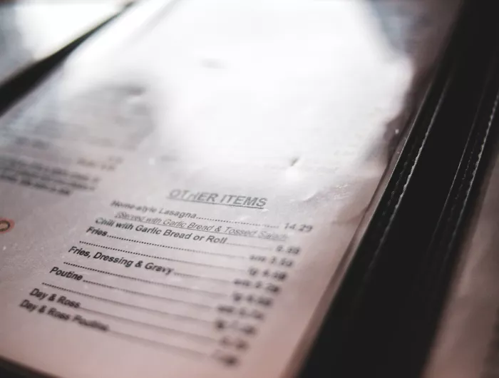 A chain restaurant menu lacking sodium warnings