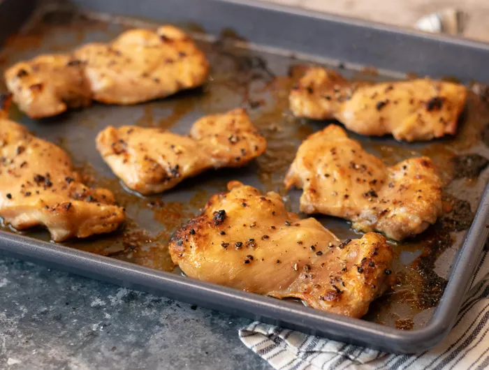 roasted chicken on a sheet pan