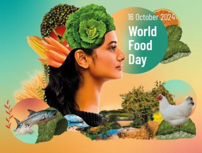 Woman with a headdress made up of vegetables and a text that says "World Food Day"