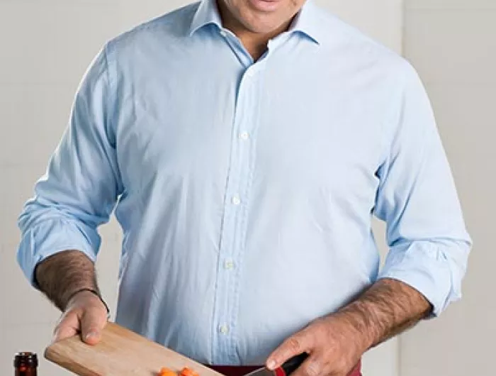 Person cutting vegetables