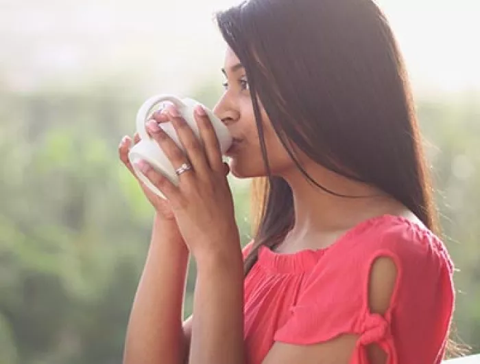 woman drinking coffee