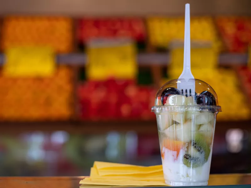 A pre-packaged fruit and yogurt cup which is a healthier alternative to sodas and candies