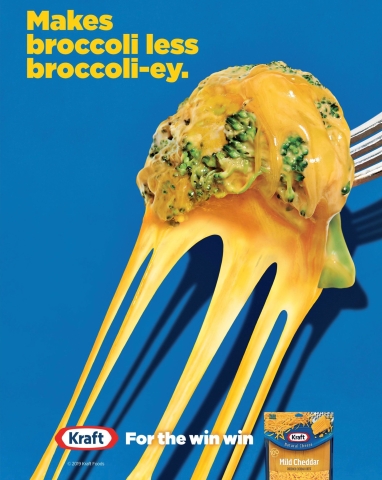A print ad for Kraft shredded cheese. It features a floret of broccoli covered in melted cheese with the words "Makes broccoli less broccoli-ey."